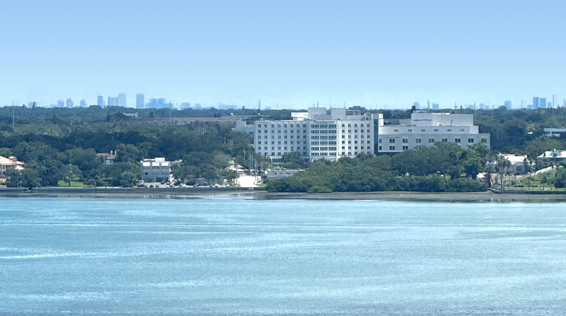Morton Plant Hospital on the Clearwater waterfront, with the Tampa skyline on the distant horizon.